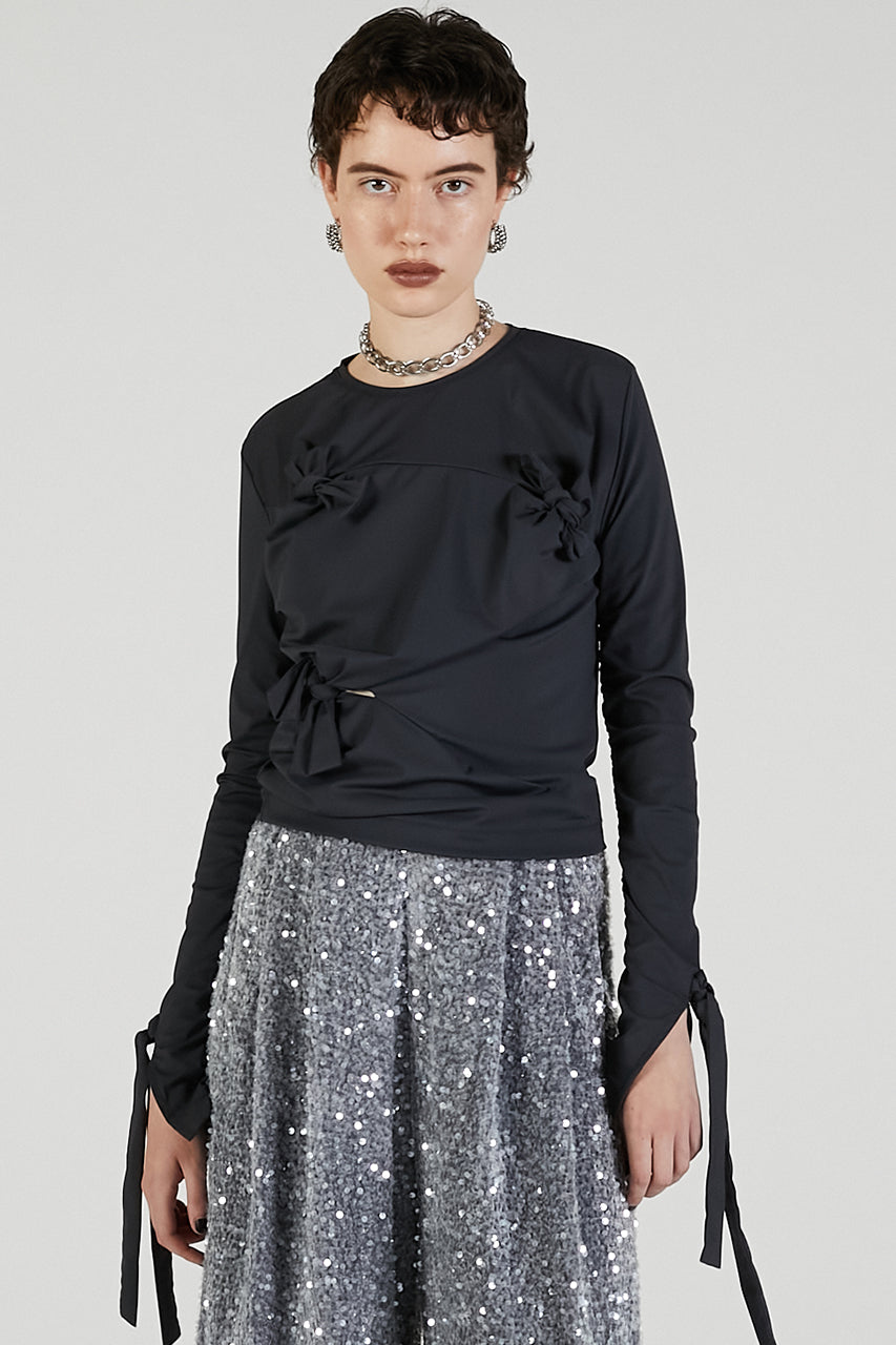 Knot Sharing Top