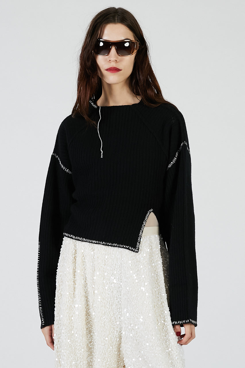Stitched over-the-shoulder knit