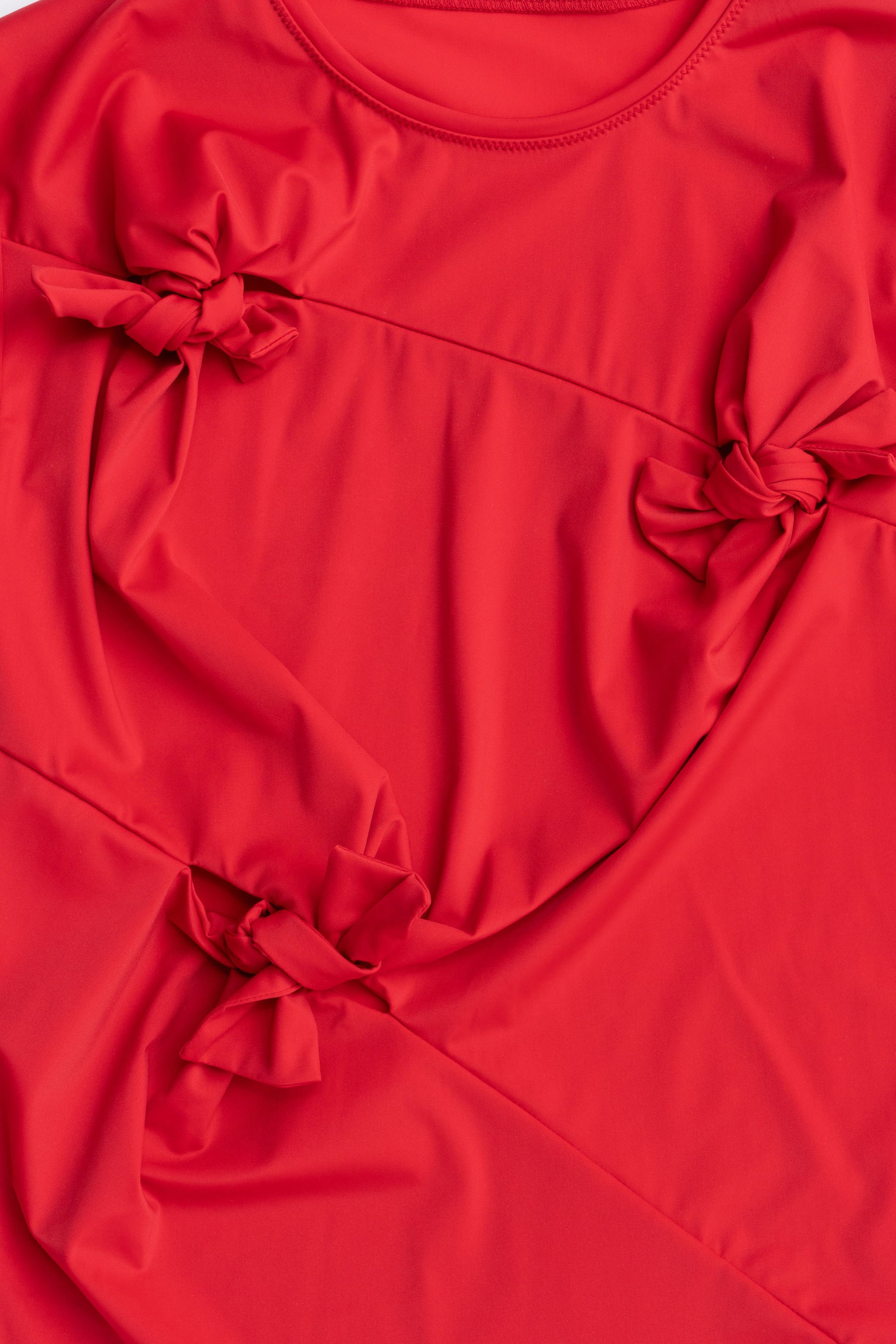 Knot Sharing Top