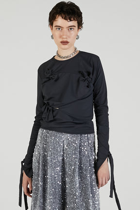 Knot Sharing Top