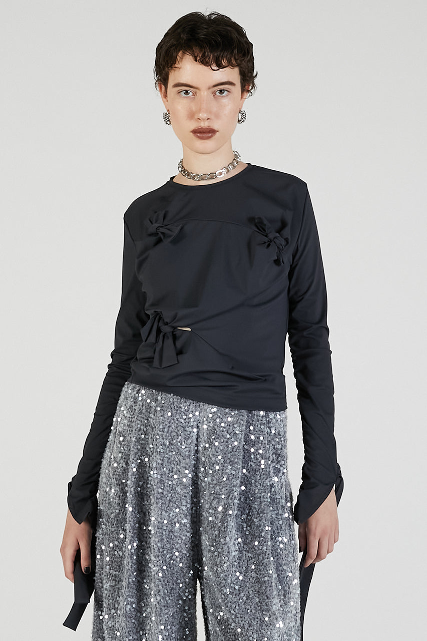 Knot Sharing Top