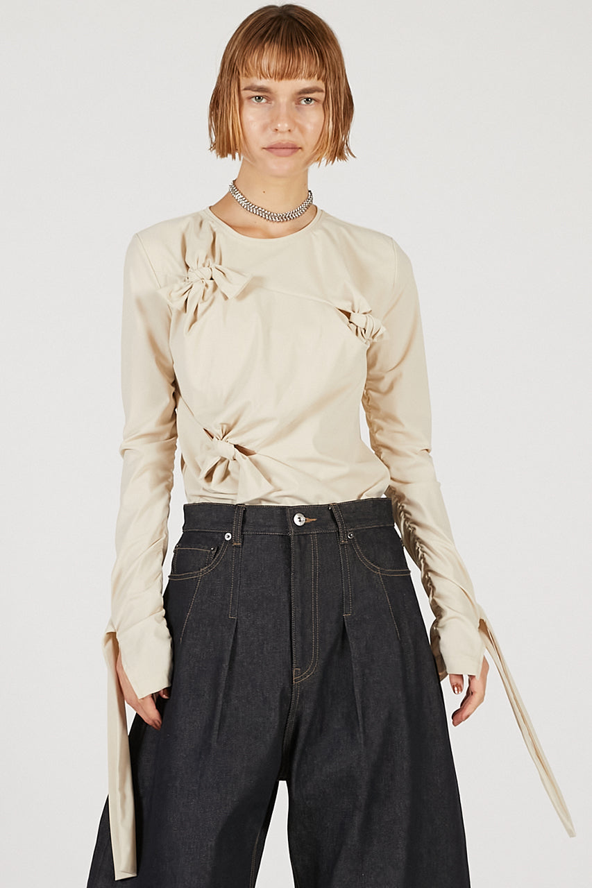 Knot Sharing Top