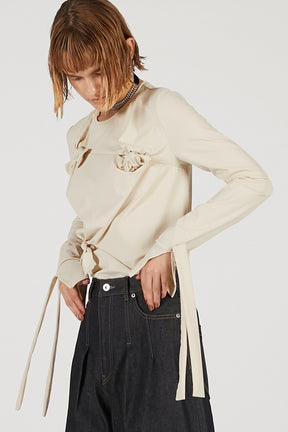 Knot Sharing Top