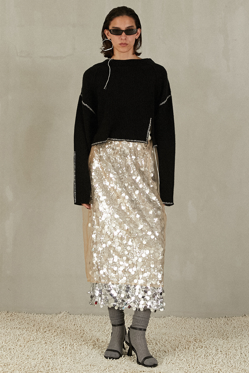 Stitched over-the-shoulder knit