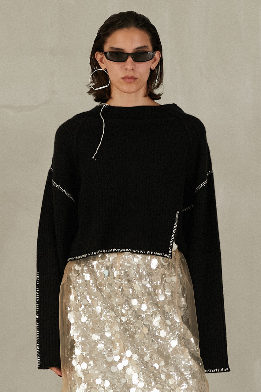 Stitched over-the-shoulder knit