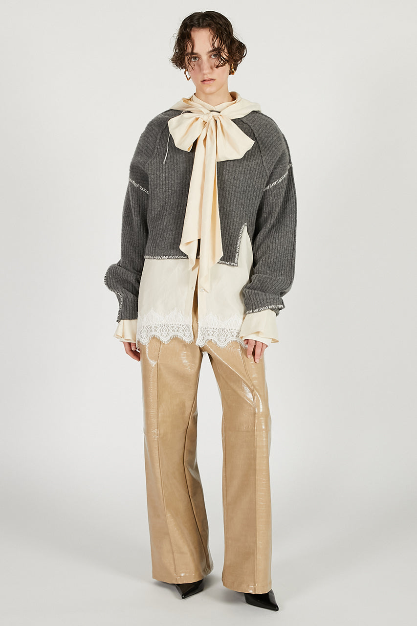 Stitched over-the-shoulder knit