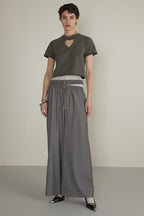 Bereung Strap Layered Skirt Slacks